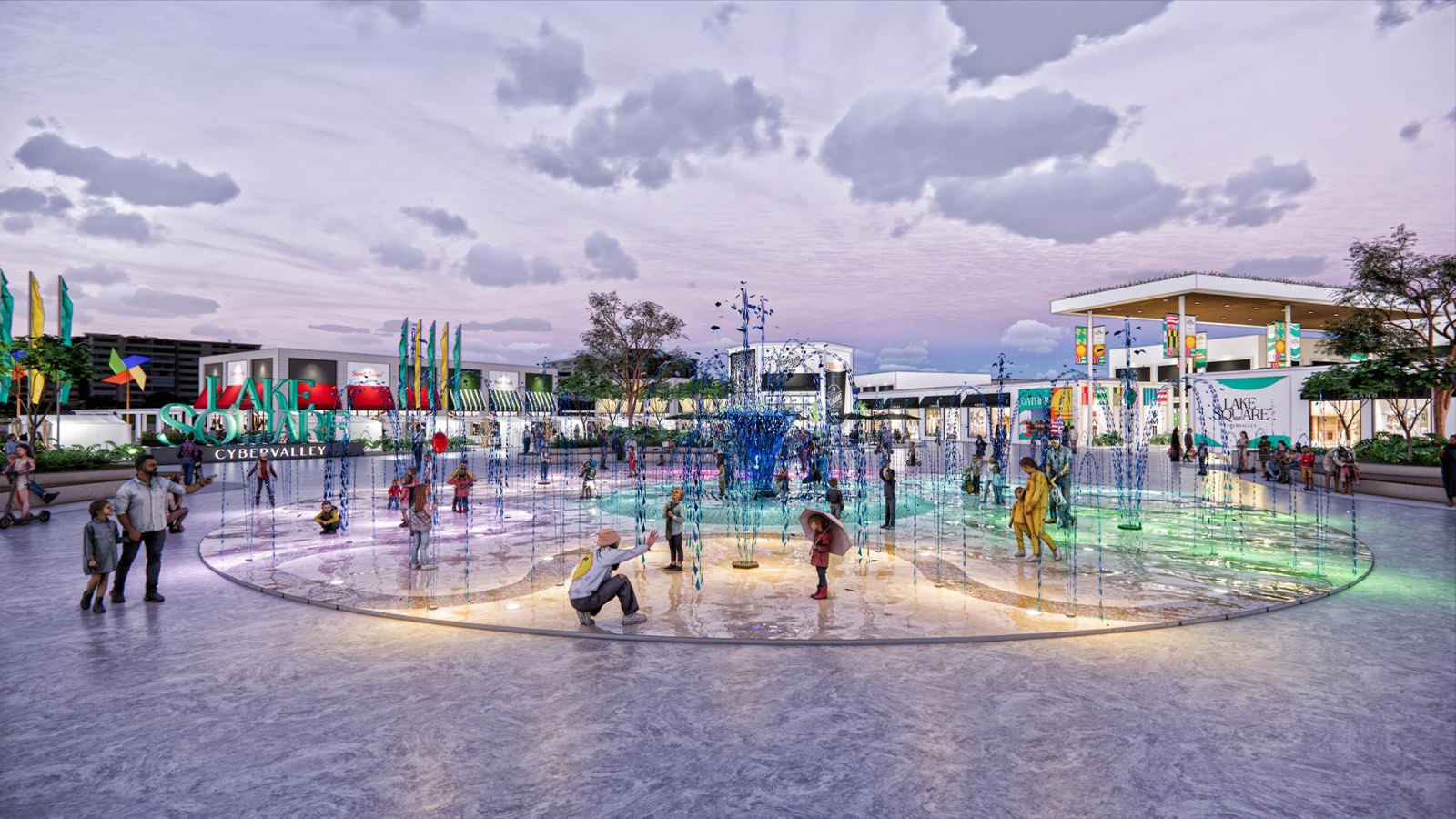 Splash-pad water feature plaza at PKNS Communal Hub at dusk